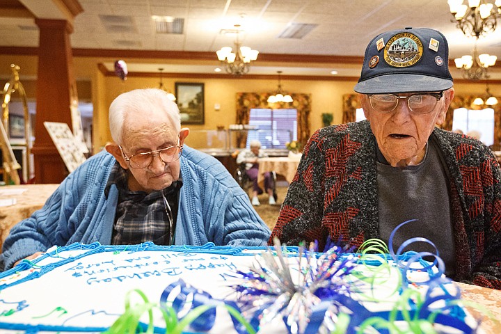 &lt;p&gt;SHAWN GUST/Press LeRoy Hensyel, right, and Bill DeVore have a look at their cake Thursday during a birthday celebration for the centurion roommates at Life Care Center in Post Falls. Hensyel turned 101 years old earlier this month and DeVore will turn 102 next week.&lt;/p&gt;