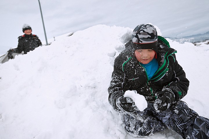 &lt;p&gt;SHAWN GUST/Press Cody Stafford, 9, takes a snowball in the back of the head Friday as friend Ashton Fredekind, 8, background grins at his momentary victory. The two enjoyed an afternoon of King of the Hill and snowball fights.&lt;/p&gt;