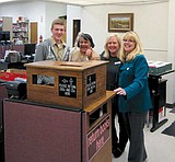 Boy Scout makes donation to ML library