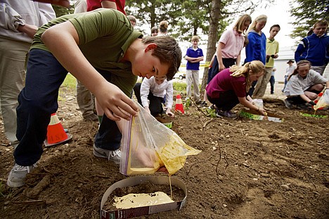 &lt;p&gt;In this file photo taken in May 2013, Garrett Moen, 13, a seventh-grade student at the North Idaho STEM Charter Academy in Rathdrum, pours plaster into a footprint at a mock crime scene during a crime scene investigation course taught by the Idaho State Police. Students learned about fingerprinting, documenting a crime scene, the importance of math and science, and how to gather evidence.&lt;/p&gt;