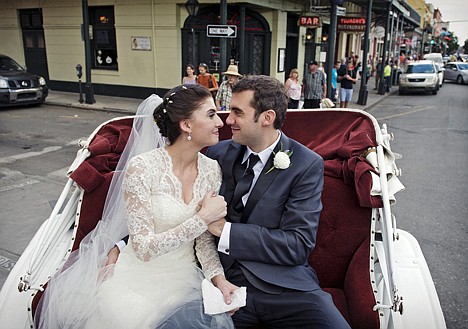 &lt;p&gt;This Oct. 12, 2013 photo provided by Julia Bailey shows Shannon and Justin Peach, riding in a carriage after their wedding in New Orleans.&lt;/p&gt;