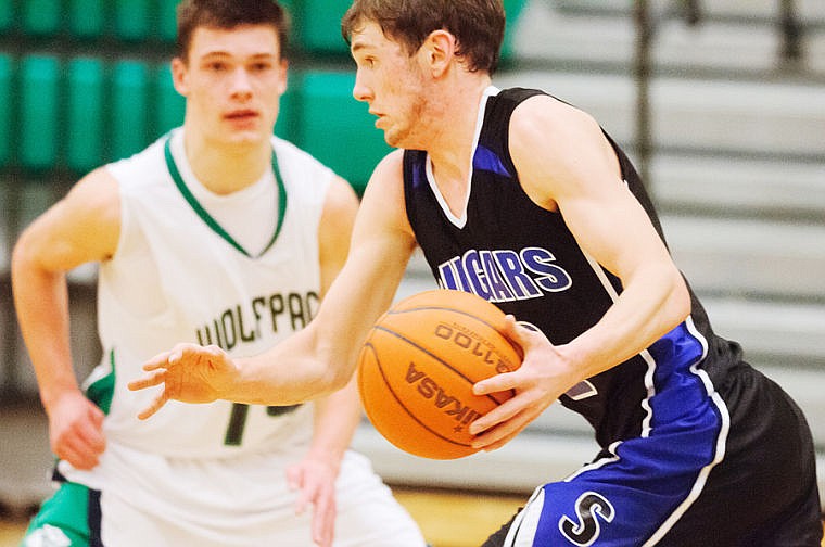 &lt;p&gt;Stillwater Christian's Josh Bray (right) brings the ball up court Tuesday night during Glacier JV's victory over Stillwater Christian at Glacier High School. (Patrick Cote/Daily Inter Lake)&lt;/p&gt;