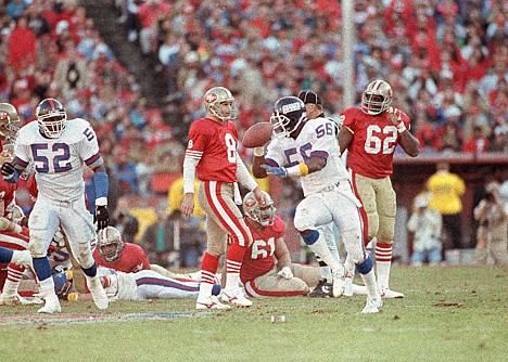 &lt;p&gt;New York Giants linebacker Lawrence Taylor (56) recovers a fumble during the fourth quarter of the NFC championship game to help New York win at San Francisco 15-13 on Jan. 20, 1991.&lt;/p&gt;