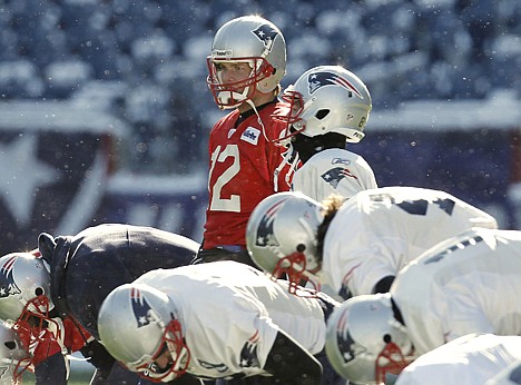 &lt;p&gt;New England Patriots quarterback Tom Brady (12) takes his place behind the offensive line during practice at Gillette Stadium in Foxborough, Mass.&lt;/p&gt;