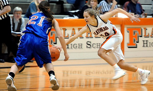 &lt;p&gt;Flathead senior Tess Brenneman (14) brings the ball up the court
during Saturday&#146;s nonconference basketball game against Columbia
Falls at Flathead High School.&lt;/p&gt;