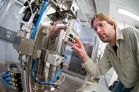 &lt;p&gt;Process engineer Bryant Polzin fills an 18650 lithium-ion battery cell with electrolyte using semi-automated equipment on Jan. 14, 2011, at Argonne's Cell Fabrication Facility in Lemont, Ill. It's been nearly a quarter of a century since the last big jump in battery technology, which led to the lithium ion. To make the next breakthrough in battery technology, researchers have to master complex chemistry, expensive manufacturing, detailed engineering, a variety of different materials, lengthy testing, stringent safety standards, and giant cost problems.&lt;/p&gt;