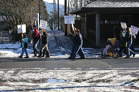 &lt;p&gt;Pro-life activists march down 10th Street in Coeur d'Alene during Saturday's Right to Life March and Rally.&lt;/p&gt;