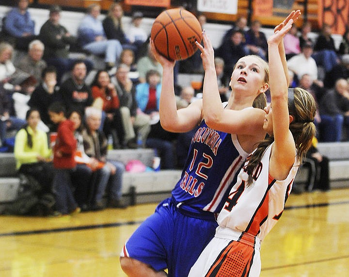 &lt;p&gt;Columbia Falls forward/guard Sydney Grilley (12) is fouled by Flathead&#146;s Stephanie Wilson as she drives to the basket during Friday&#146;s nonconference girls basketball game at Flathead High School. (Aaric Bryan/Daily Inter Lake)&lt;/p&gt;