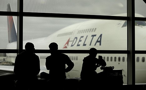 &lt;p&gt;Travelers on Delta Airlines waits for flights, in Detroit, on Oct. 29, 2012.&lt;/p&gt;