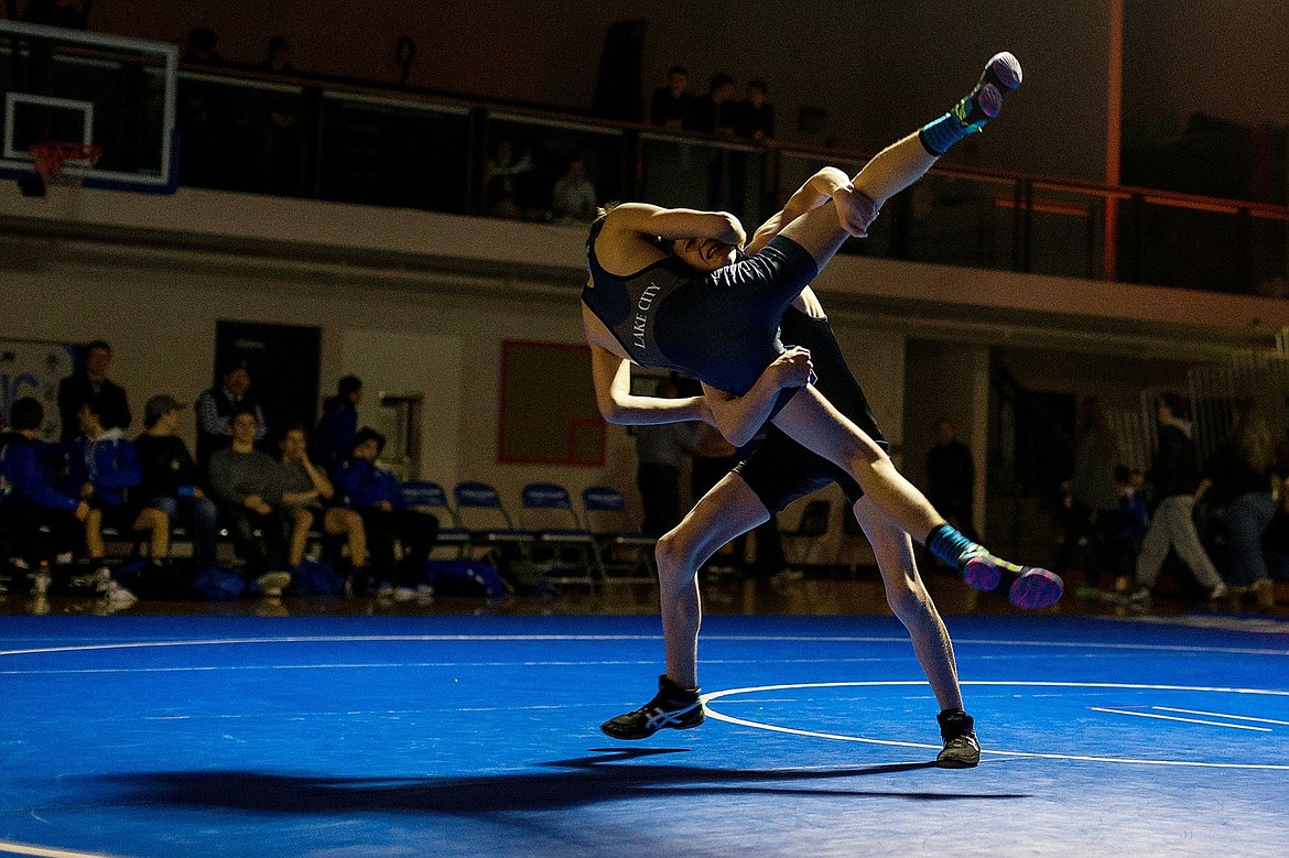 &lt;p&gt;SHAWN GUST/Press Coeur d&#146;Alene High&#146;s Jacob Krous tosses Lake City&#146;s Cyrus Mortensen in the first period of the 106-pound match.&lt;/p&gt;