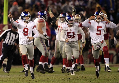 &lt;p&gt;New York Giants kicker Lawrence Tynes (9) and punter Steve Weatherford (5) celebrate after Tynes kicked the game-winning field goal during overtime of the NFC Championship game Sunday in San Francisco. The Giants won 20-17 to advance to Super Bowl XLVI.&lt;/p&gt;