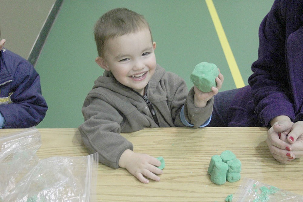 &lt;p&gt;Shawn Farris creates an original sculpture using homemade play dough during the family event in St. Regis.&lt;/p&gt;