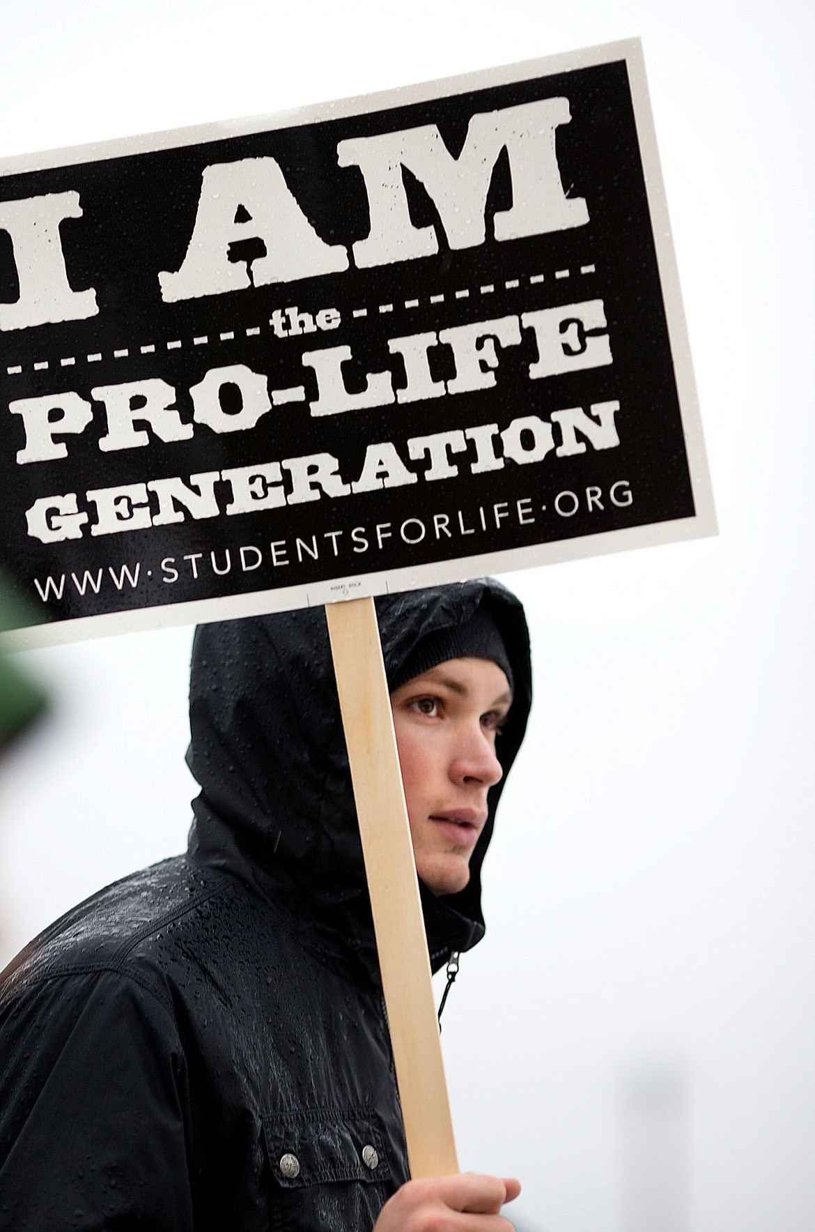 &lt;p&gt;Kenny Dodge, a student at Lewis and Clark State College, holds an anit-abortion sign on Saturday during an annual pro-life rally in Coeur d'Alene.&lt;/p&gt;