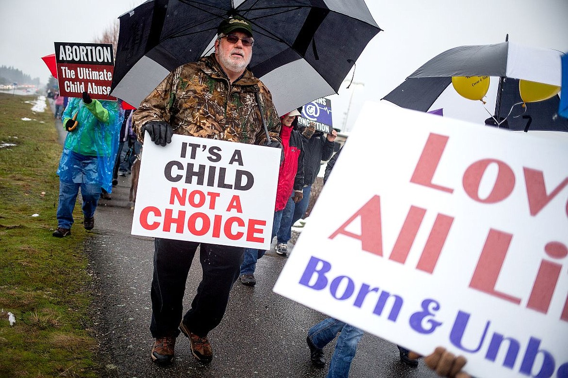 &lt;p&gt;David Murley of Hayden walks with more than one hundred other people on Saturday supporting pro-life during the 36th annual pro-life rally in Coeur d'Alene.&lt;/p&gt;