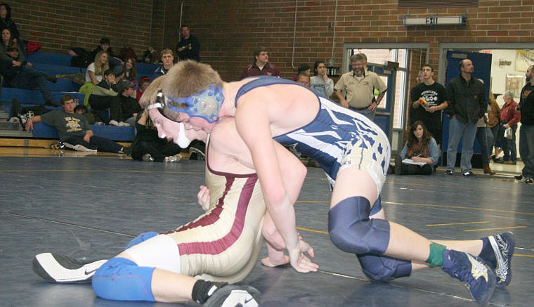 &lt;p&gt;A Bluehawk wrestler works on getting a pin during the tournament.&lt;/p&gt;