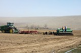 Potatoes, touchdowns: Farmer works for both