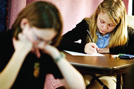 &lt;p&gt;Breanna Ronald, 12, answers question on an exam Thursday at Pascal Academy in Post Falls. The private school is the first in the area to adopt Singapore Math, which takes a different approach to teaching students math.&lt;/p&gt;