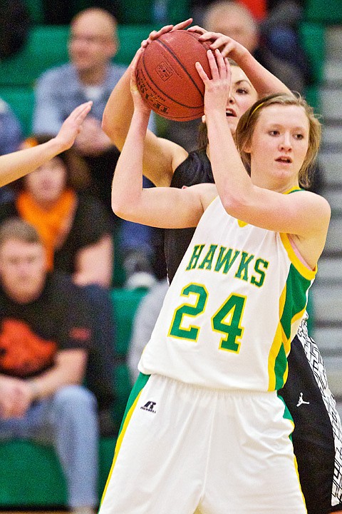 &lt;p&gt;JEROME A. POLLOS/Press Lakeland High's Christie Wendle nearly has the ball stolen by Dani Failor from Post Falls as she attempts to make a pass out of the key.&lt;/p&gt;