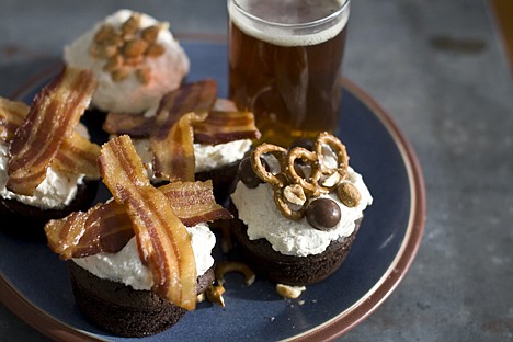 &lt;p&gt;This Jan. 4, 2012 photo shows Super Bowl cupcakes in Concord, N.H. These cupcakes are big, bold, manly and totally down for a Super Bowl spread. (AP Photo/Matthew Mead)&lt;/p&gt;