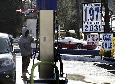 &lt;p&gt;A motorist pumps gas at a station where the cash price for regular unleaded was under $2 a gallon, in Leonia, N.J., on Jan 9.&#160;&lt;/p&gt;