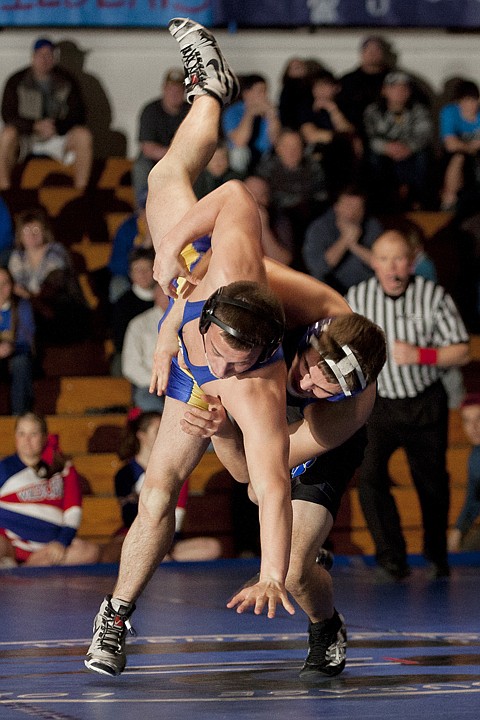 &lt;p&gt;Libby&#146;s Kyle Leir (left) sticks an arm out to break his fall
while being taken down by Columbia Falls senior Kohl Thompson
during their 145-pound match Thursday night at Columbia Falls.&lt;/p&gt;