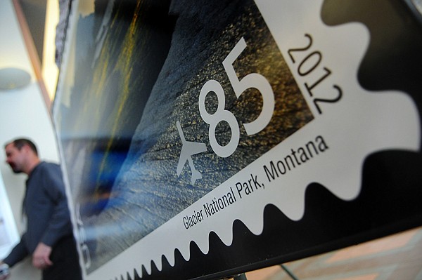 &lt;p&gt;A visitor at the Glacier National Park Stamp First-Day-Of-Issue
ceremony walks past an enlargement of the new international rate
stamp Thursday afternoon in Kalispell. The stamp features a
photograph of Logan Pass by National Geographic photographer
Michael Melford and is part of the U.S. Postal Service&#146;s Scenic
American Landscapes series.&lt;/p&gt;