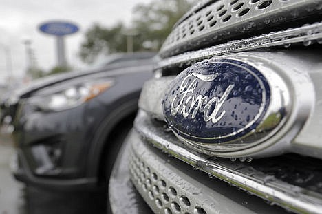 &lt;p&gt;Ford vehicles sit on the lot at a car dealership, in Brandon, Fla., on Jan. 12.&#160;&lt;/p&gt;