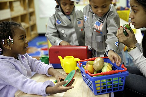 &lt;p&gt;Oumou Balde, 4, left, plays with her teacher Jacqualine Sanchez, right, and some pretend food in a pre-kindergarten class at the Sheltering Arms Learning Center in New York. Balde participated in a program that was produced in conjunction with Sesame Street to educate children about nutrition and health.&lt;/p&gt;