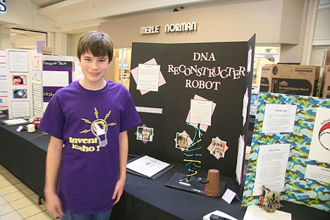 &lt;p&gt;Garrett Hoyt, 12, of Sandpoint, stands with his &#147;DNA Reconstructer Robot&#148; project, an invention he dreamed up to help eradicate DNA-related diseases and conditions such as Down syndrome.&lt;/p&gt;