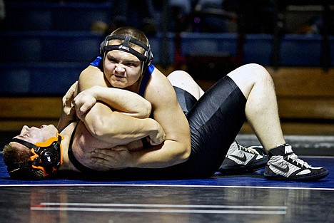 &lt;p&gt;Coeur d'Alene High's Dakota Groves maintains control of Eugene Thompson from Post Falls as he works his way into position for the pin in the 285-pound match.&lt;/p&gt;