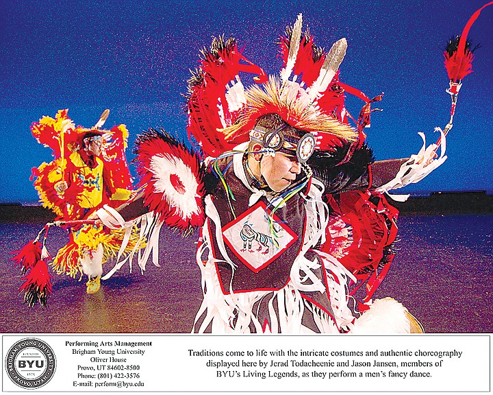 Traditions come to life with the intricate costumes and authentic choreography displayed here by Jerad Todacheenie and Jason Jansen, members of BYU's Living Legends, as they perform a men's fancy dance.