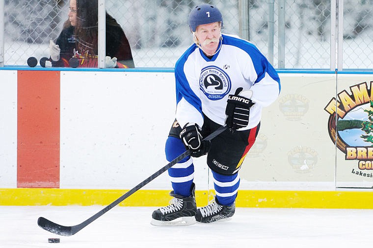 &lt;p&gt;Former NHL star Lanny McDonald brings the puck up the ice Friday afternoon during the first game of the third annual Craft Brewers Cup at the Woodland Park ice rink. Games continue today starting at 7:30 a.m. with the championship game scheduled for 4:30 p.m.. There will also be a Craft Brewers Cup Brew Fest beginning at 2 p.m.. All proceeds from the brew fest will go towards the Flathead Valley Hockey Association and its effort to purchase a Zamboni. Jan. 24, 2014 in Kalispell, Montana. (Patrick Cote/Daily Inter Lake)&lt;/p&gt;