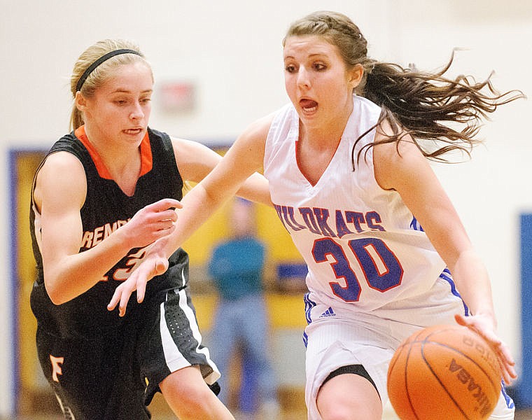 &lt;p&gt;Columbia Falls sophomore guard Miranda Livingston (30) drives past Frenchtown sophomore Allie Moe (23) during Saturday&#146;s Northwestern A girls basketball game at Columbia Falls.&#160;&lt;/p&gt;