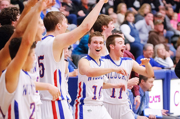 &lt;p&gt;The Columbia Falls bench celebrates after Jackson Barta hit a three-point field goal from 30 feet out at the buzzer in the Wildcats 70-30 Northwestern A boys basketball victory over Frenchtown on Saturday in Columbia Falls.&#160;&lt;/p&gt;