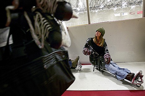 &lt;p&gt;Michelle Porter watches as the hockey teams leave from their game that preceded the sled hockey team's practice Saturday, Jan. 19 at Frontier Ice Arena in Coeur d'Alene.&lt;/p&gt;