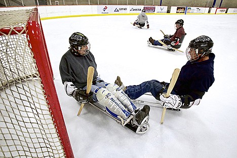 &lt;p&gt;Fred Margiotta, left, blocks the goal as he tries to reject a rush on the net by Don Waddell.&lt;/p&gt;