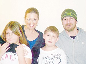 &lt;p&gt;Zach, surrounded by sister Belle, mother Carmella Pederson and father Tatum Haines take a family photo.&lt;/p&gt;