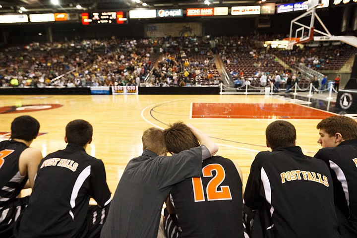 &lt;p&gt;SHAWN GSUT/Press Anthony King, director of operations for the Post Falls boys basketball team, hugs senior Taylor Valente Saturday, March 3, 2012 as the final seconds wind down in the 5A boys state championship game at the Idaho Center in Nampa.&lt;/p&gt;