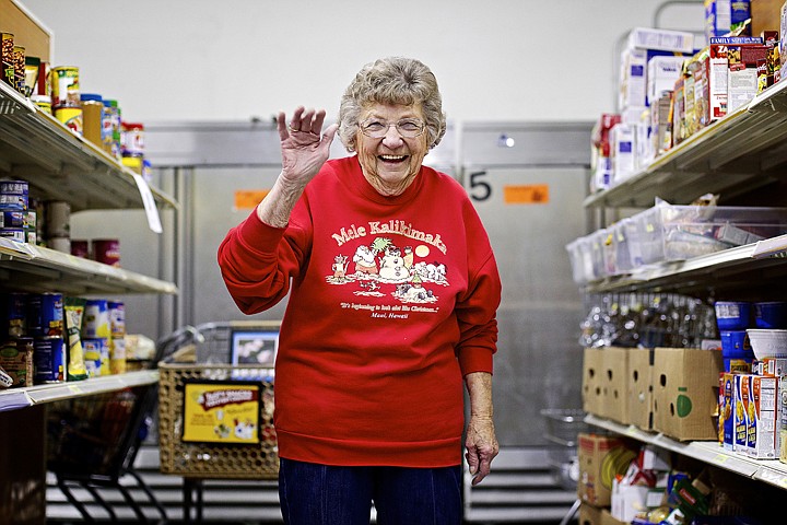 &lt;p&gt;JEROME A. POLLOS/Press Maxine Nelson, 84, a volunteer at the Post Falls Food Bank, waves to a friend at the end of her shift Tuesday.&lt;/p&gt;