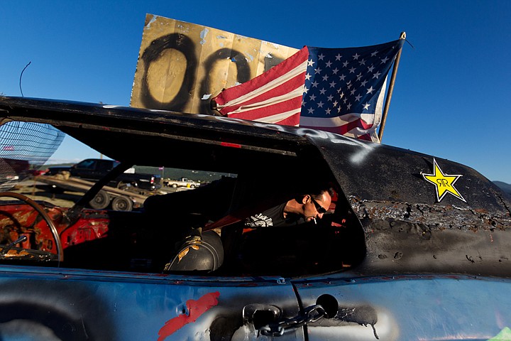 &lt;p&gt;SHAWN GUST/Press In the pits, Darrell Parsley makes some final adjustments to his son's race car prior to trophy dash racing in Post Falls.&lt;/p&gt;