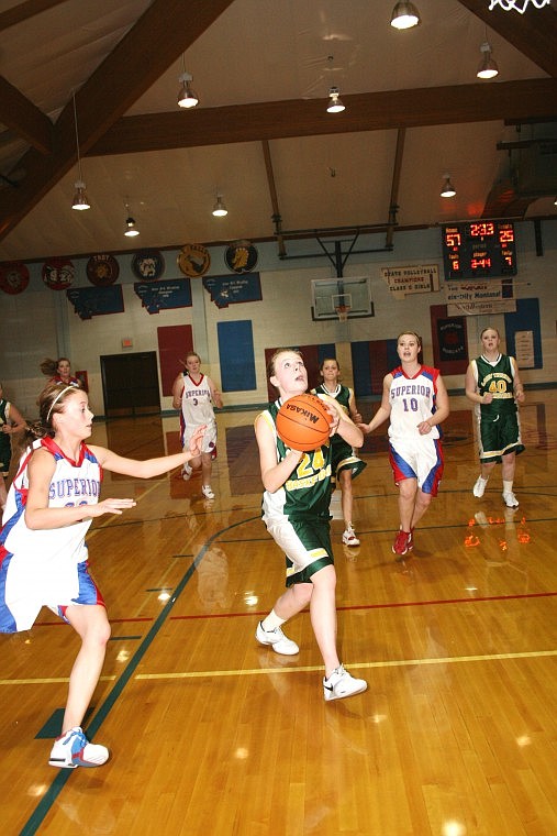 St. Regis Lady Tiger Brianna Managhan goes up for a shot during a game against Superior Thursday evening.