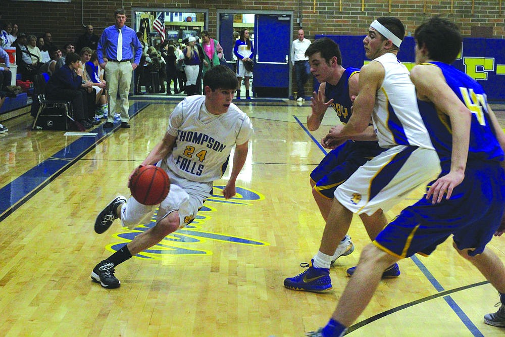 &lt;p&gt;Senior guard Dalton Hooten heads towards the basket during the Bluehawks win over Libby.&lt;/p&gt;