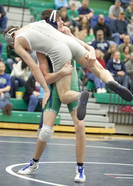 &lt;p&gt;Glacier&#146;s Alek Mitchell takes down Matt West-Reed of Helena High
during Saturday&#146;s 125-pound match at Glacier High School.&lt;/p&gt;