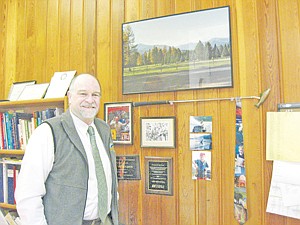<p>Most Libby High School students may not prefer a view of Principal Rik Rewerts’ office. However, the inner sanctum is loaded with family mementos of Rewerts’ life and time spent with family members. The black-and-white photograph is an image of a 10-year-old Rewerts who hunted pheasant with his father and uncles. Other images are of skiing and fishing trips, Cabinet View Golf Course and a rainbow trout putter. </p>