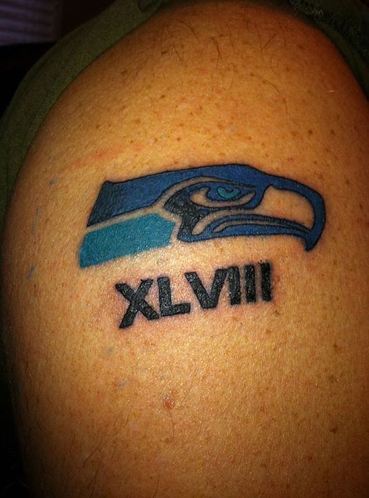 &lt;p&gt;Courtesy photo&lt;/p&gt;&lt;p&gt;Jack Cluff, of Coeur d'Alene, shows off his Seahawk ink. The logo was tattooed on his arm the day before Super Bowl XL in 2006 when the Seahawks lost to Pittsburgh. When the 'hawks returned to the Super Bowl in 2014, Cluff didn't want to jinx the game again, so he decided to wait until they won before adding additional ink. The day after last year's game, he had the Roman numerals &quot;VIII&quot; added to his &quot;XL&quot;. &quot;This year I will get the trophy put on it, come Monday after they win,&quot; Cluff told The Press.&lt;/p&gt;