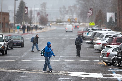 &lt;p&gt;Students walk across College Drive through a flurry of snow Tuesday on the campus of North Idaho College. The North Idaho College Board of Trustees discussed their position regarding legislation on live firearms on campus last night.&lt;/p&gt;