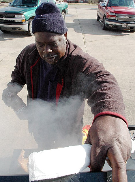 <p>Rick Johnson, 55, cooks chicken for victims of the tornadoes that hit Alabama recently in a church parking lot in Cordova, Ala., on Friday. Johnson is among the survivors of last year's April tornado outbreak who are pitching in to assist communities that were struck by the most recent onslaught.</p>
