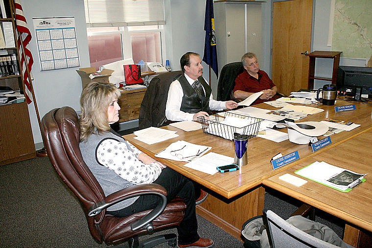 &lt;p&gt;Mineral County Commissioners Laurie Johnston, Roman Zylawy and Duane Simons discuss the differences in maps of the Lookout Pass Ski Resort expansion at their weekly meeting.&lt;/p&gt;