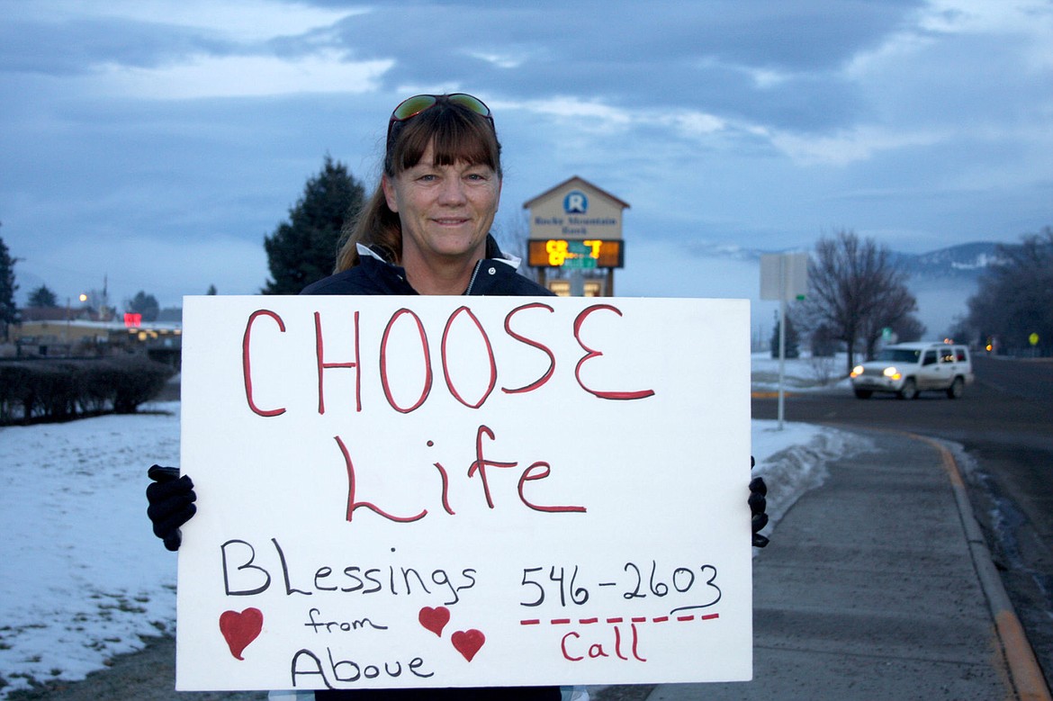 &lt;p&gt;&lt;strong&gt;Terrie Woods holds a sign reminding people about the Supreme Court&#146;s decision on Roe v Wade, Friday morning. The March of Life was also held in Thompson Falls.&lt;/strong&gt;&lt;/p&gt;