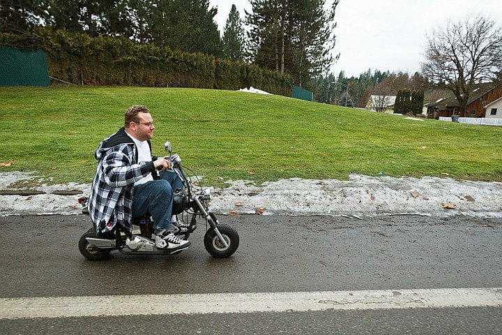 &lt;p&gt;Unusually warm January temperatures allow Steve Johnson to ride his minibike along the streets of Coeur d'Alene.&lt;/p&gt;